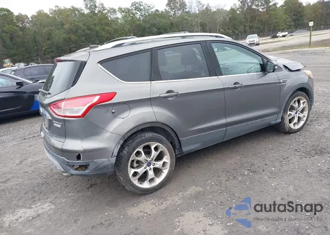 2014 Ford Escape Titanium z USA, uszkodzony, nr VIN 1FMCU0J94EUD63458
